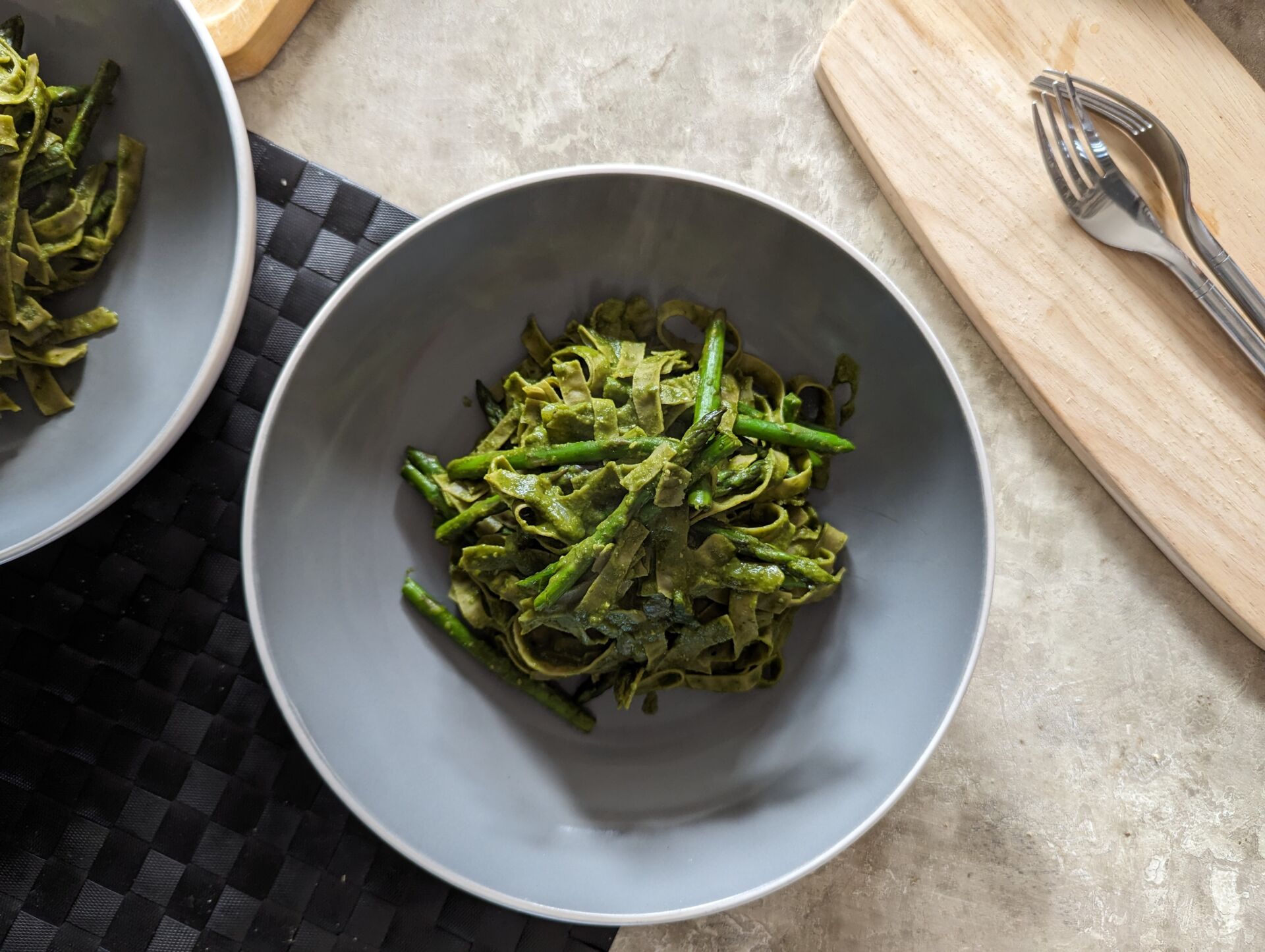 lemon asparagus fettuccine on a table, shot from above