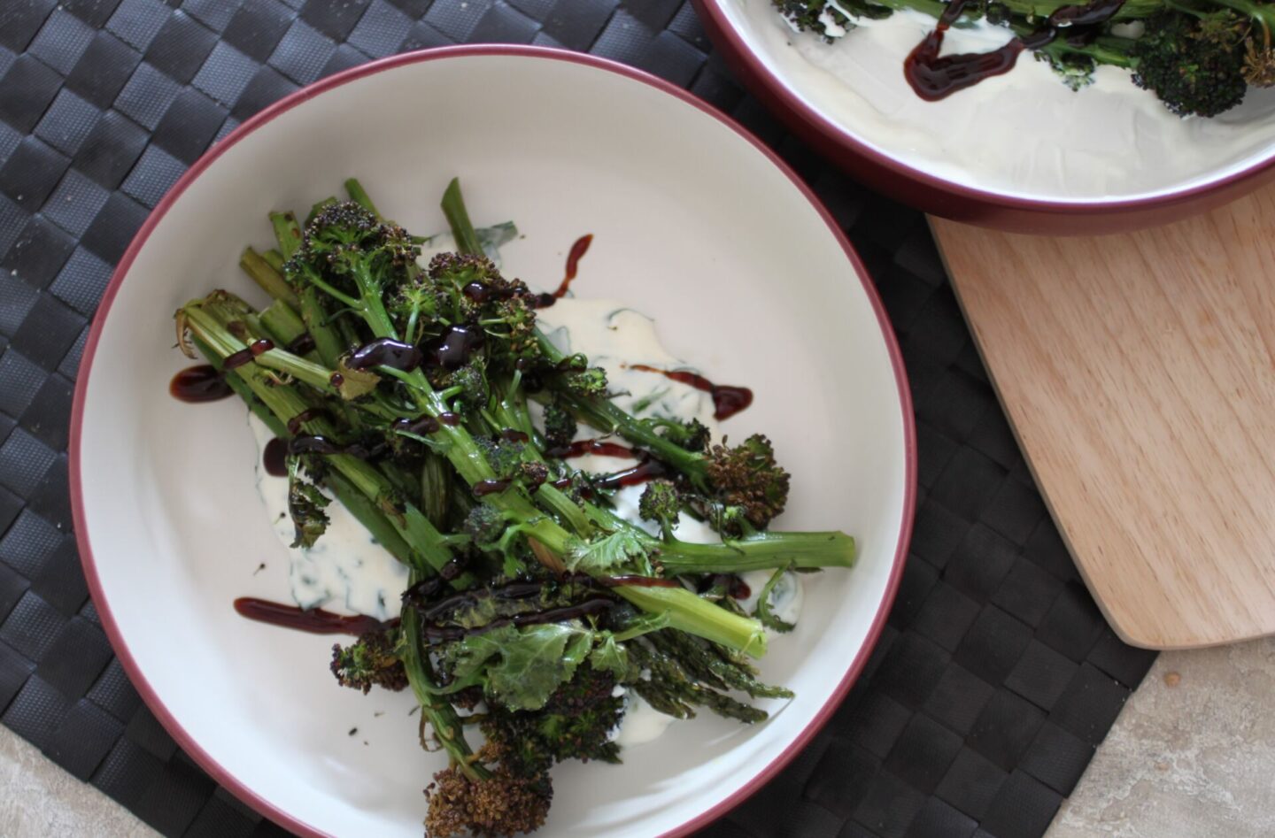 bowls of roasted greens topped with lemon basil yoghurt
