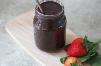 beetroot smoothie in a kilner jar on a wooden board