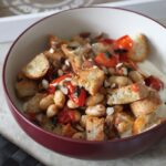 bowl of bruschetta bake placed on a table