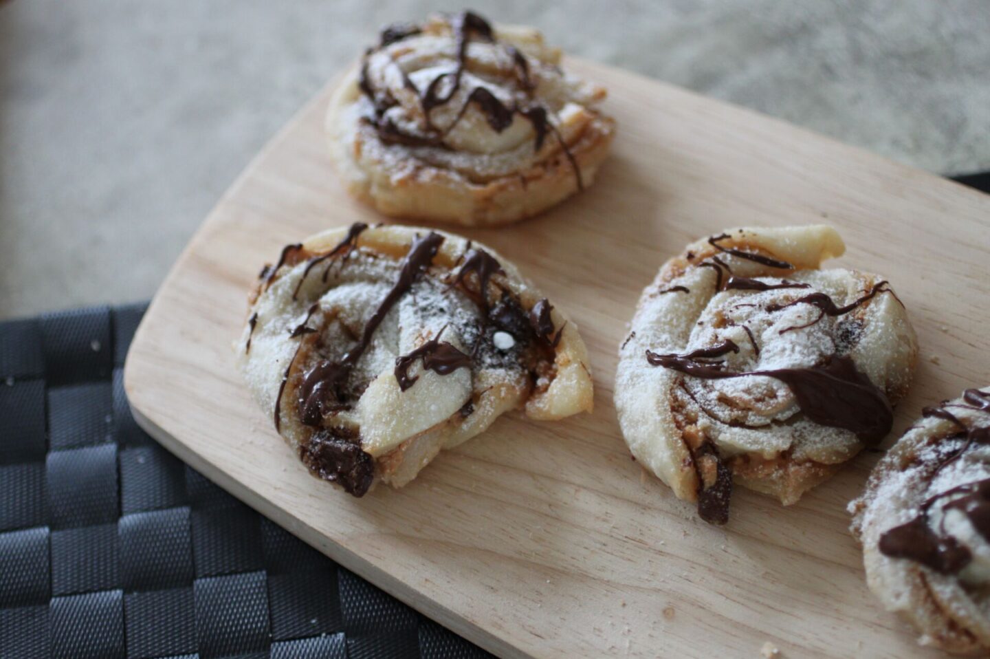peanut butter chocolate swirls on a wooden tray