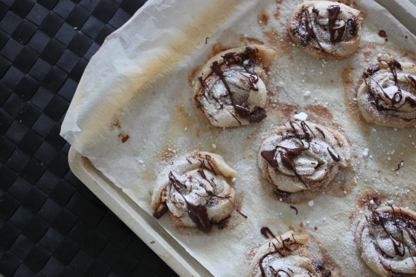 tray of freshly baked peanut butter chocolate swirls placed on a table