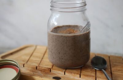 jar of peanut butter protein chia pudding placed on a tray