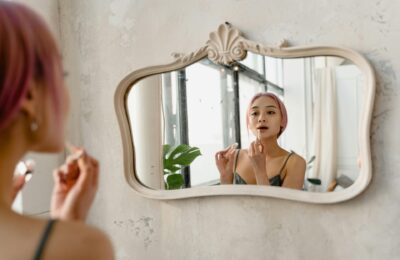 woman looking in the mirror