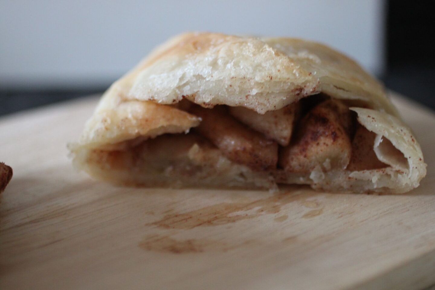 close up of apple braid showing the cooked apples 