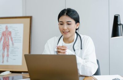 doctor sat at desk