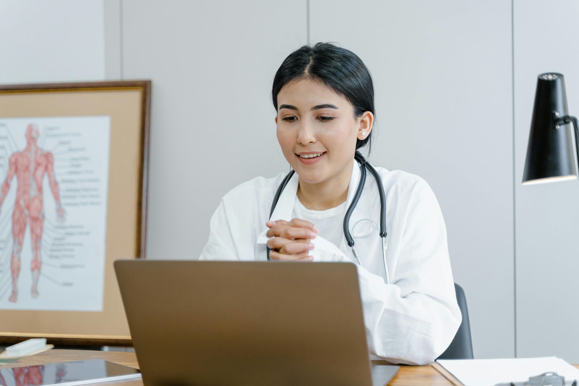 doctor sat at desk