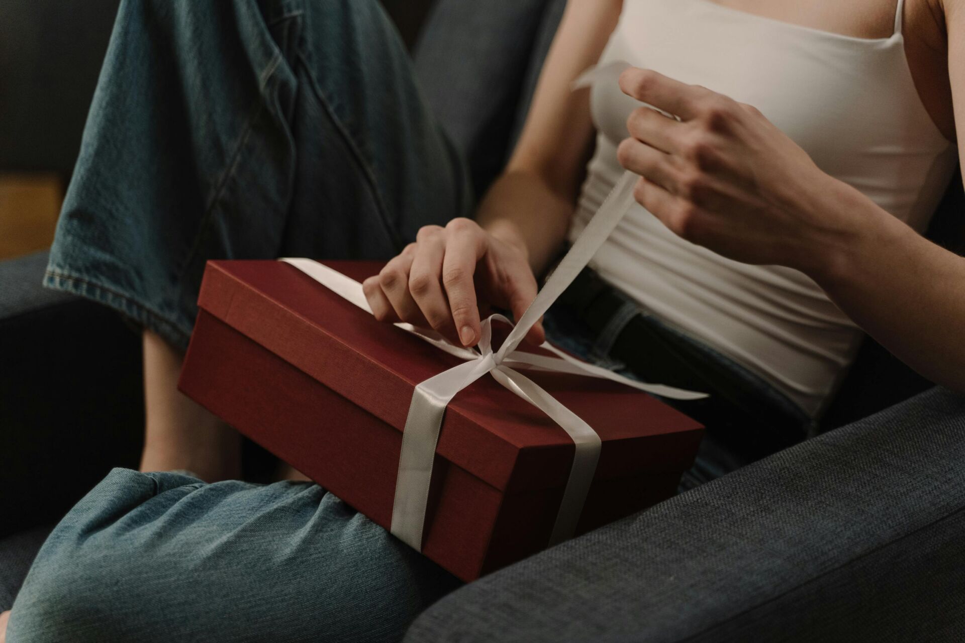 woman opening a gift