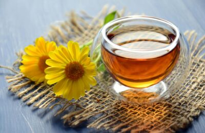 glass cup filled with herbal tea