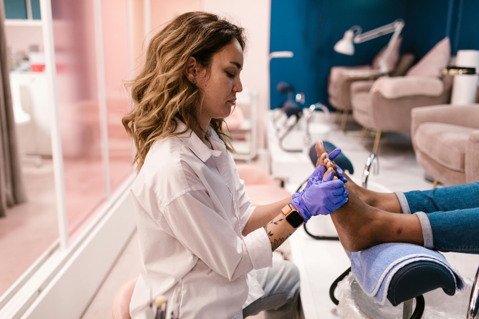 woman giving someone a pedicure