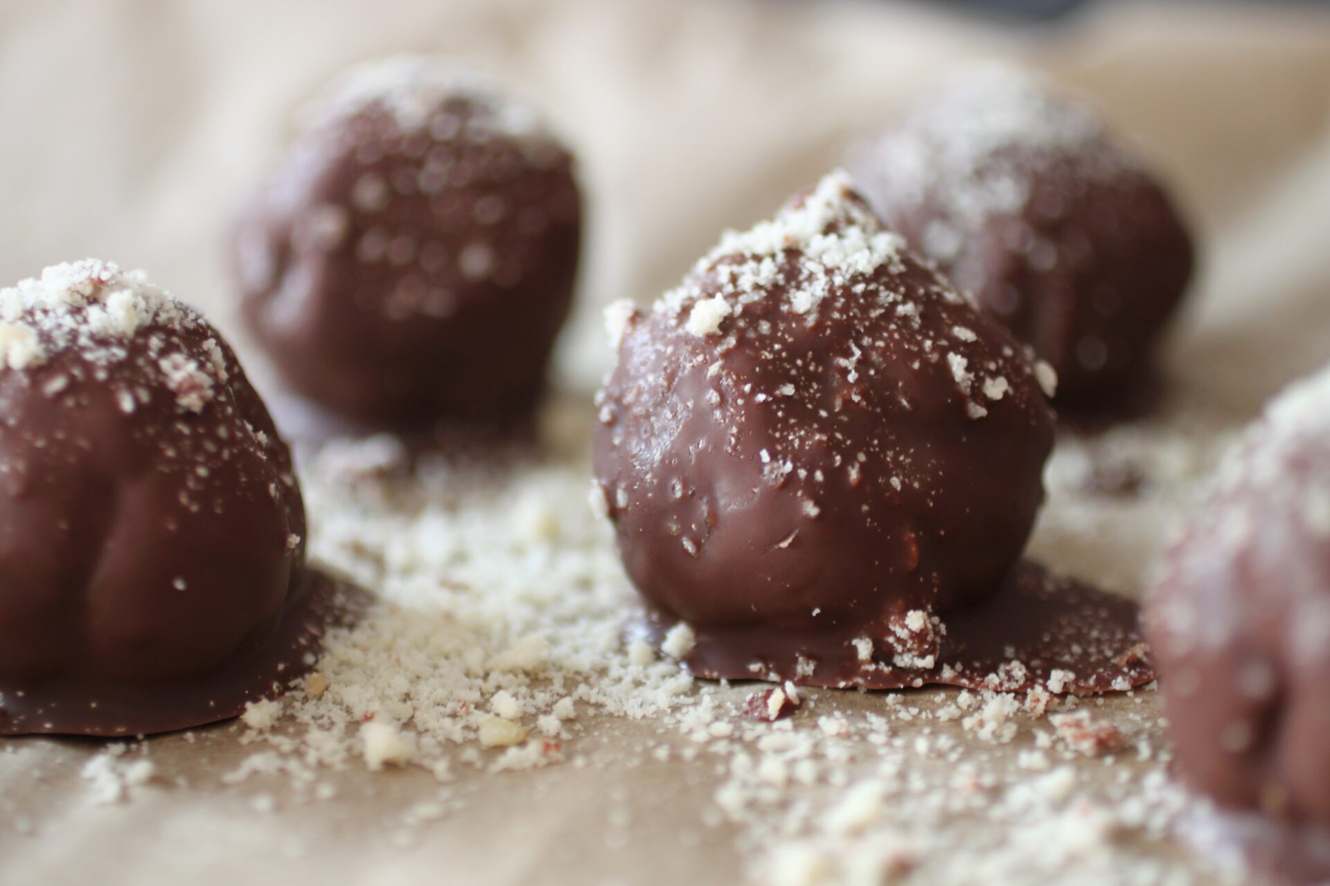 tray if pistachio butter bites covered in ground almonds