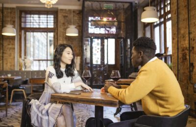 two people at a dinner table