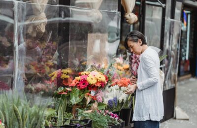 woman shopping for flowers